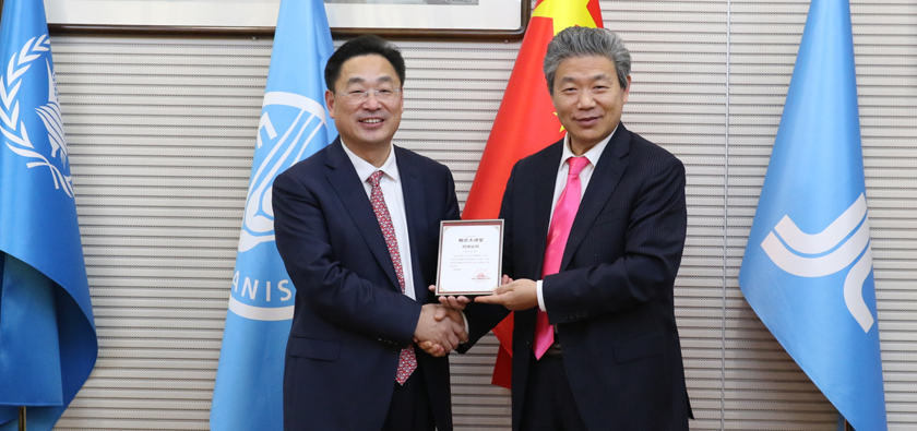 朱信凯会见粮农组织总干事屈冬玉并为2026年粮农大讲堂开讲